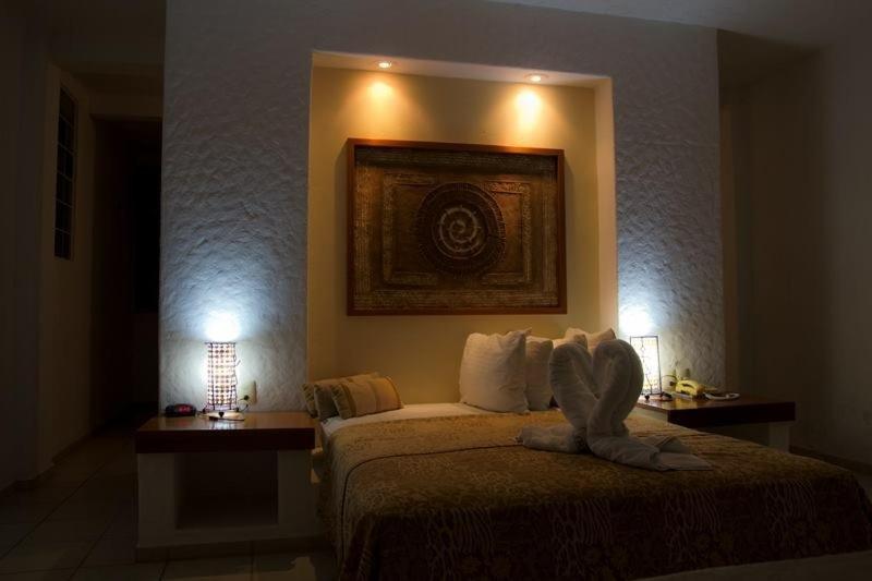 Hotel Villas Xaiba ปูแอร์โตเอสกอนดิโด ภายนอก รูปภาพ