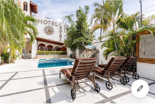 Hotel Villas Xaiba ปูแอร์โตเอสกอนดิโด ภายนอก รูปภาพ