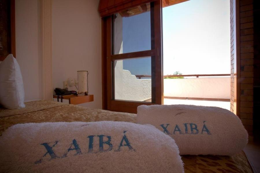 Hotel Villas Xaiba ปูแอร์โตเอสกอนดิโด ภายนอก รูปภาพ