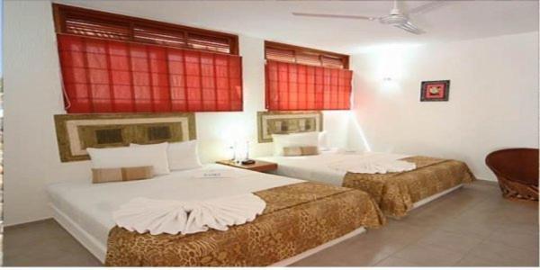 Hotel Villas Xaiba ปูแอร์โตเอสกอนดิโด ห้อง รูปภาพ