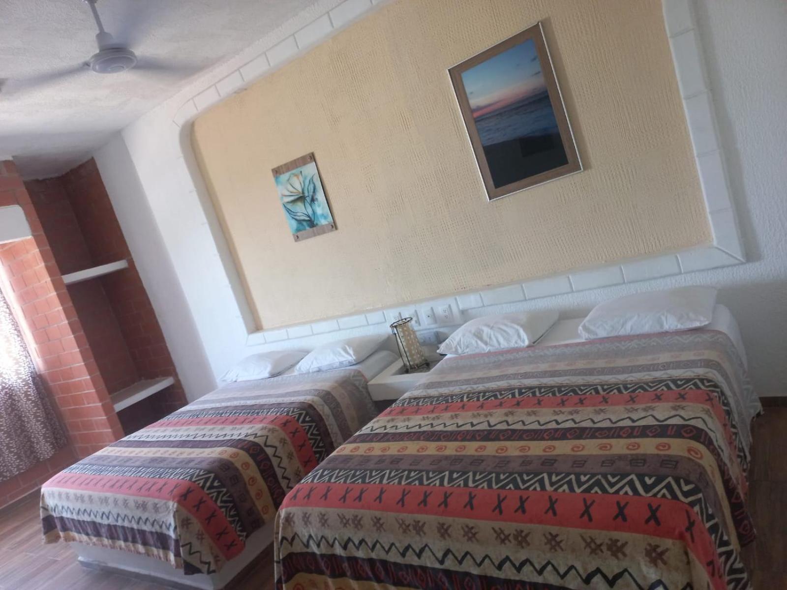 Hotel Villas Xaiba ปูแอร์โตเอสกอนดิโด ภายนอก รูปภาพ