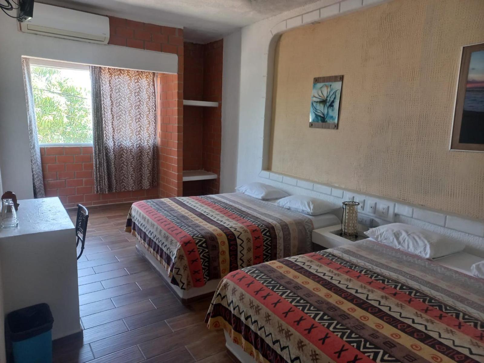 Hotel Villas Xaiba ปูแอร์โตเอสกอนดิโด ภายนอก รูปภาพ