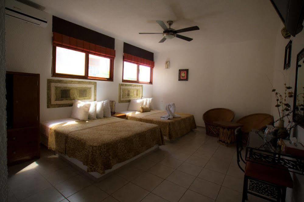 Hotel Villas Xaiba ปูแอร์โตเอสกอนดิโด ภายนอก รูปภาพ