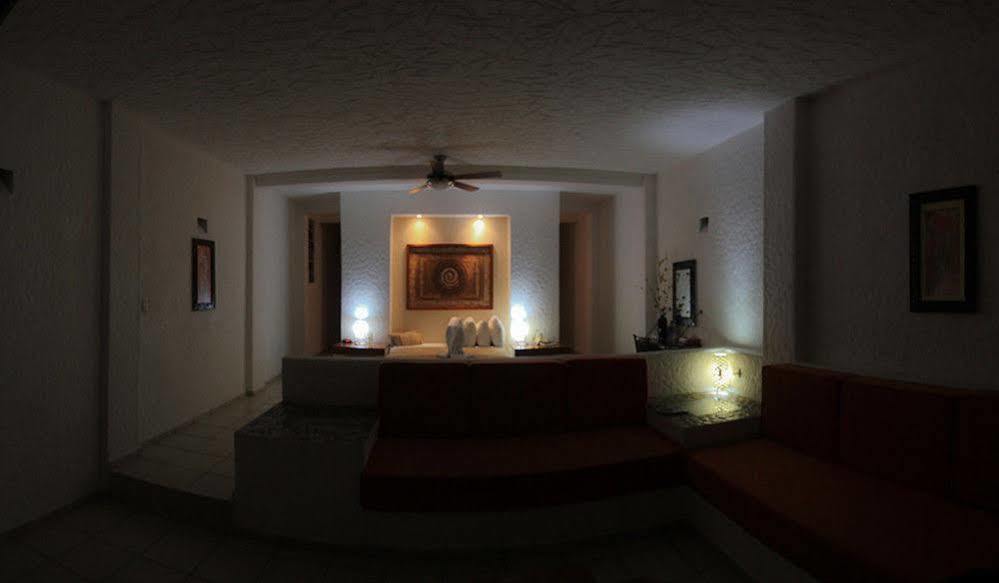 Hotel Villas Xaiba ปูแอร์โตเอสกอนดิโด ภายนอก รูปภาพ