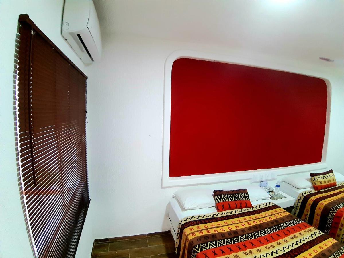 Hotel Villas Xaiba ปูแอร์โตเอสกอนดิโด ภายนอก รูปภาพ